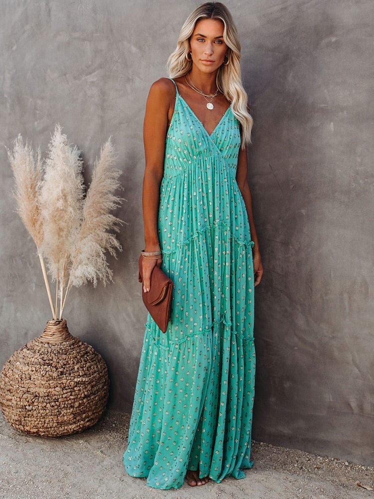 https://cdn.shopify.com/s/files/1/0880/2333/5247/files/groene-maxi-jurk-met-v-hals-en-zomers-ibiza-printje-50781512335686.jpg?v=1735256180
