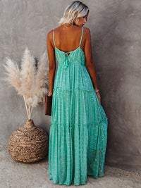 https://cdn.shopify.com/s/files/1/0880/2333/5247/files/groene-maxi-jurk-met-v-hals-en-zomers-ibiza-printje-50781512827206.jpg?v=1735256180
